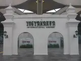 Gerbang putih bertuliskan Yogyakarta International Airport / White entrance bearing the words Yogyakarta International Airport
