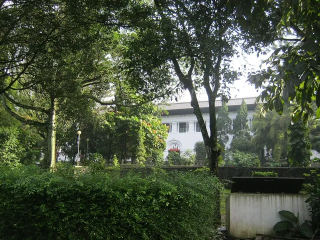 Museum Pos Indonesia di balik taman dan pepohonan, Juni 2013. / Museum Pos Indonesia behind a garden and trees, June 2013.
